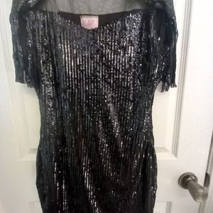 Mechelle's Ltd line of Clothing & prom/ homecoming dresses as well as wedding